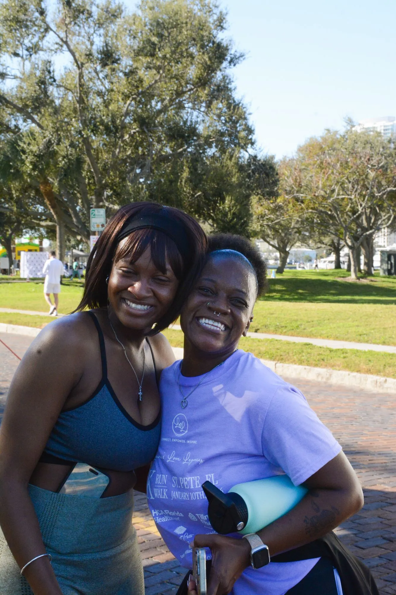 Two women share a smile at the 2026 Legacy Run